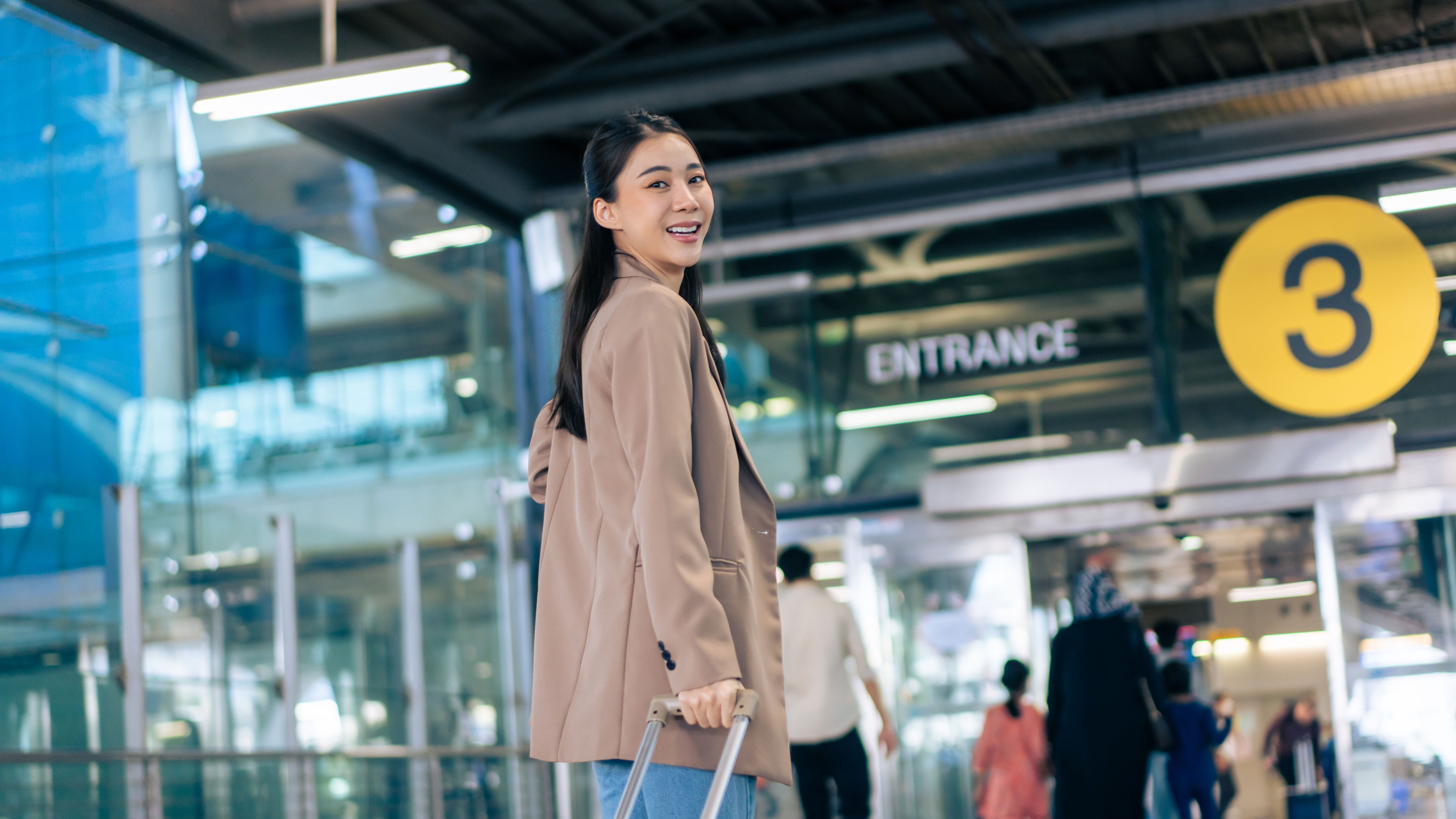 Asian girl is walking in airport