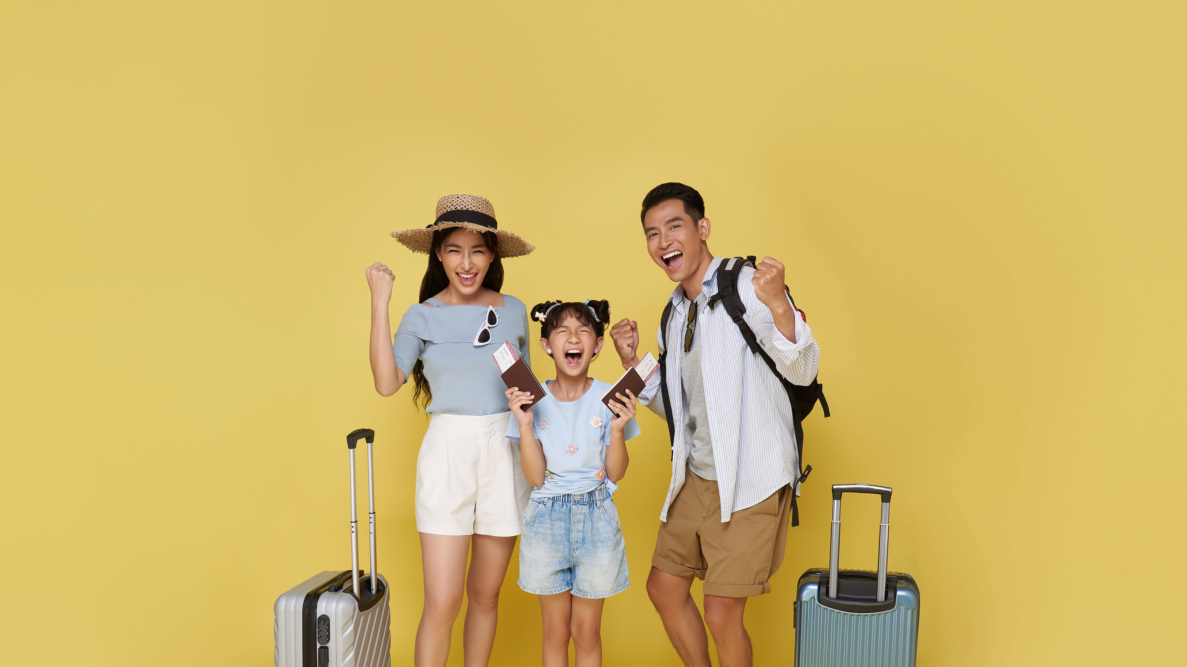 Happy fun asian family vacation portrait.